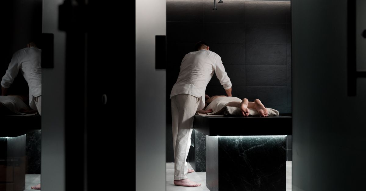 A relaxing massage in a modern spa room promoting wellness and self-care.