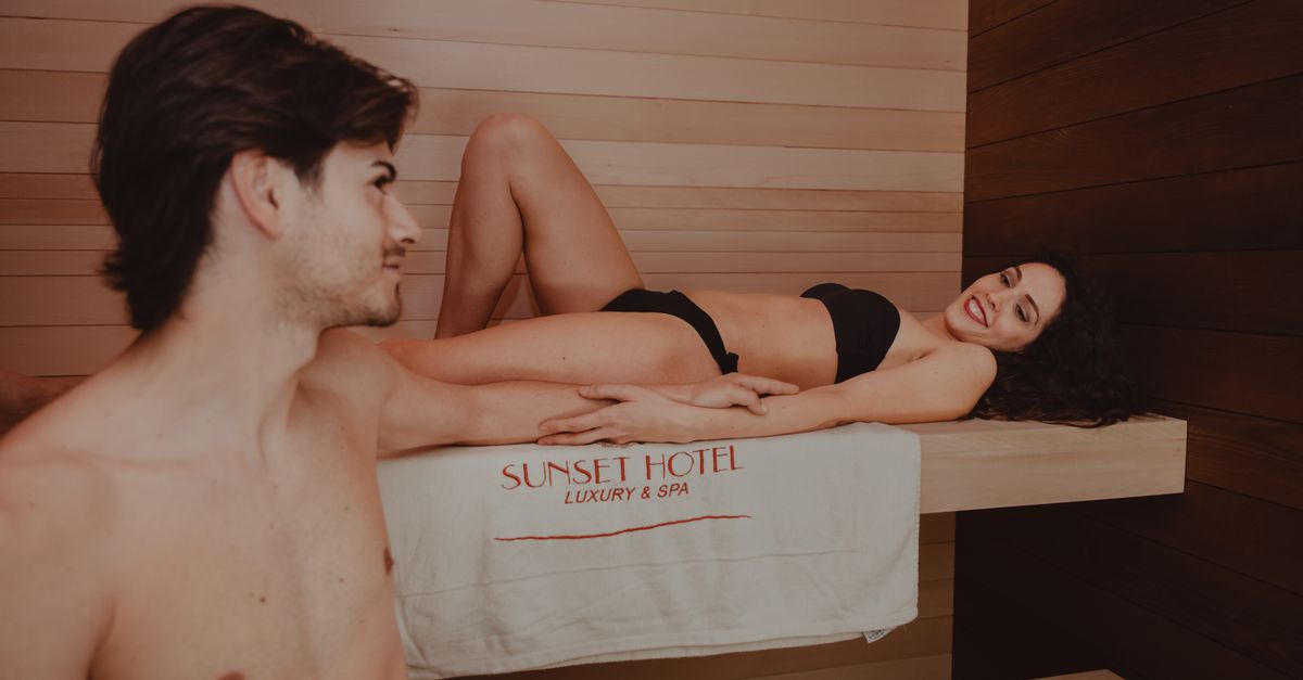 Couple relaxing at Sunset Hotel luxury spa, enjoying a calm and tranquil ambiance.